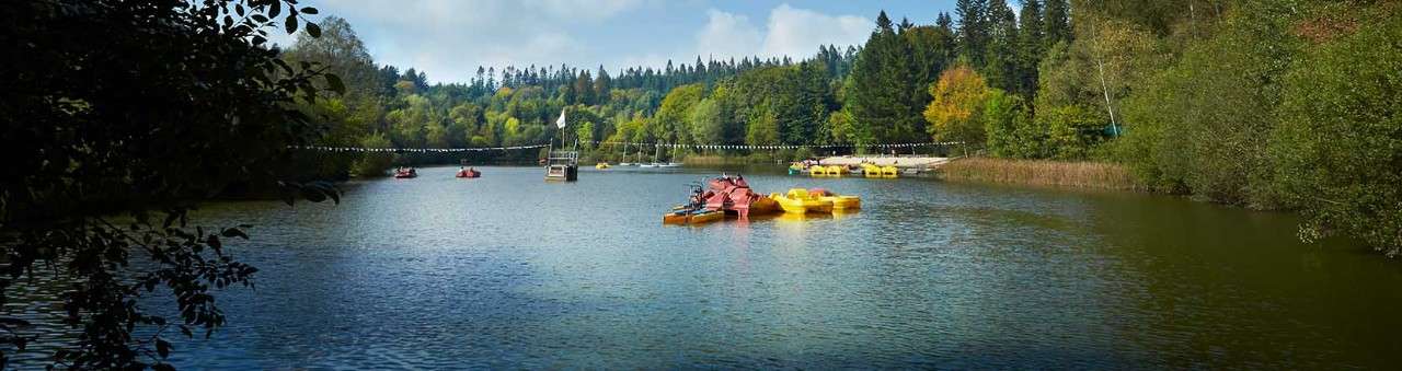 Lake with boats on it at Longleat forest  