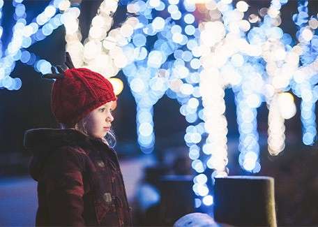 Child gazing at forest lights