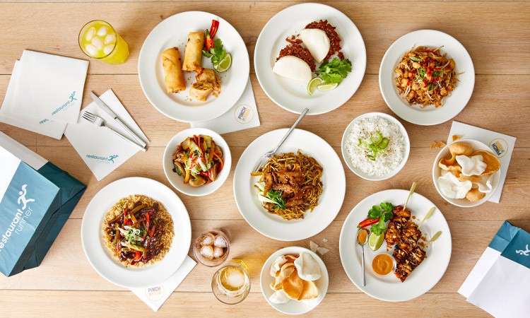 A table with a selection of dishes from the Restaurant Runner menu