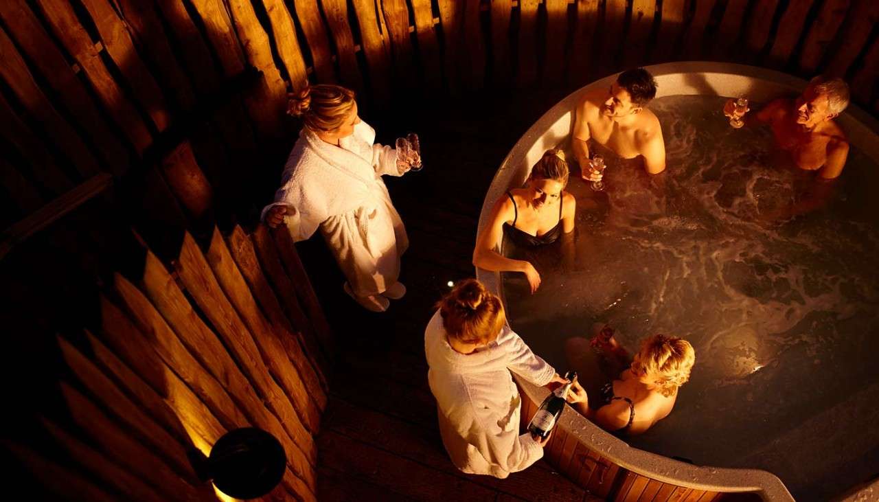 Group enjoying hot tub