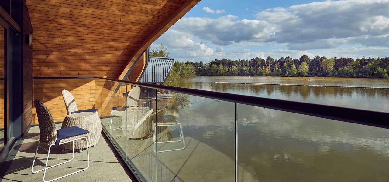Image of lake from the balcony of a Waterside lodge