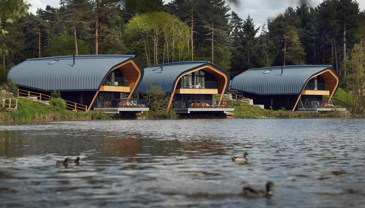 Three Waterside Lodges overlooking the lake 