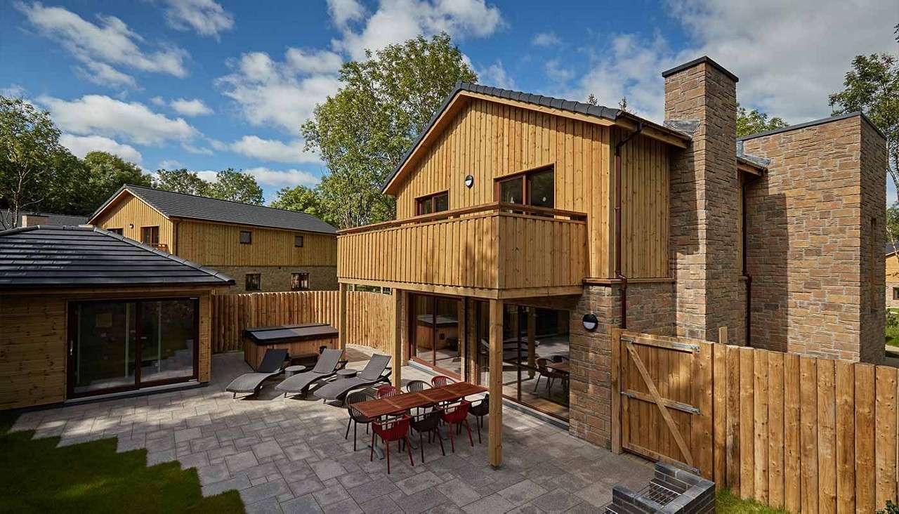 The patio and exterior of an Exclusive Lodge 