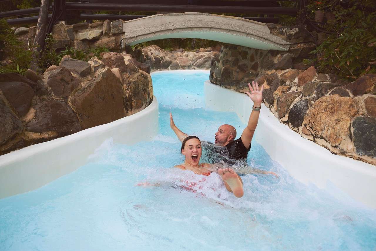 two people going down the wild water rapids 