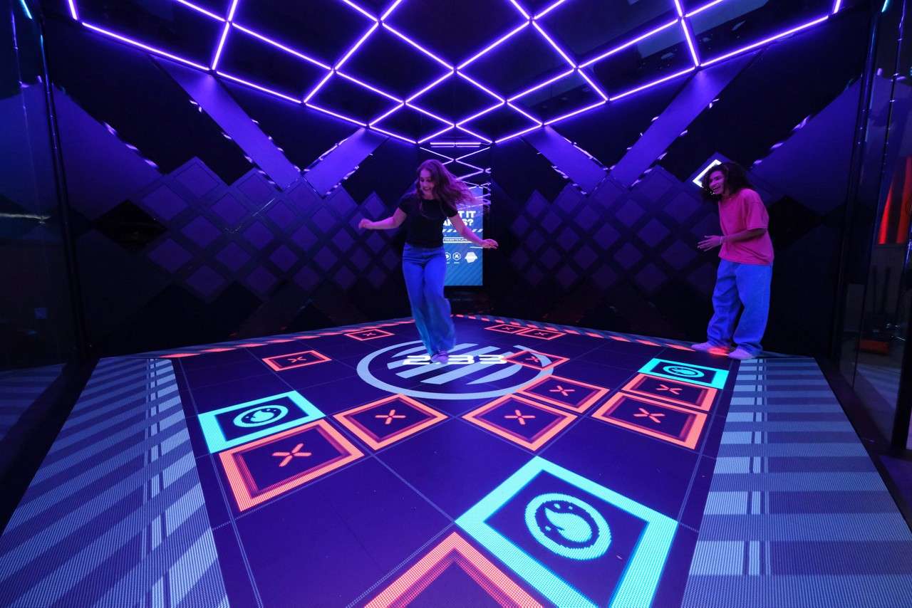 Woman jumping in the ARENA.