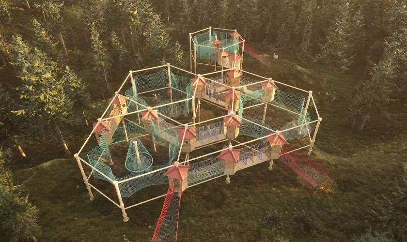 3D render of a net arena suspended in the trees.