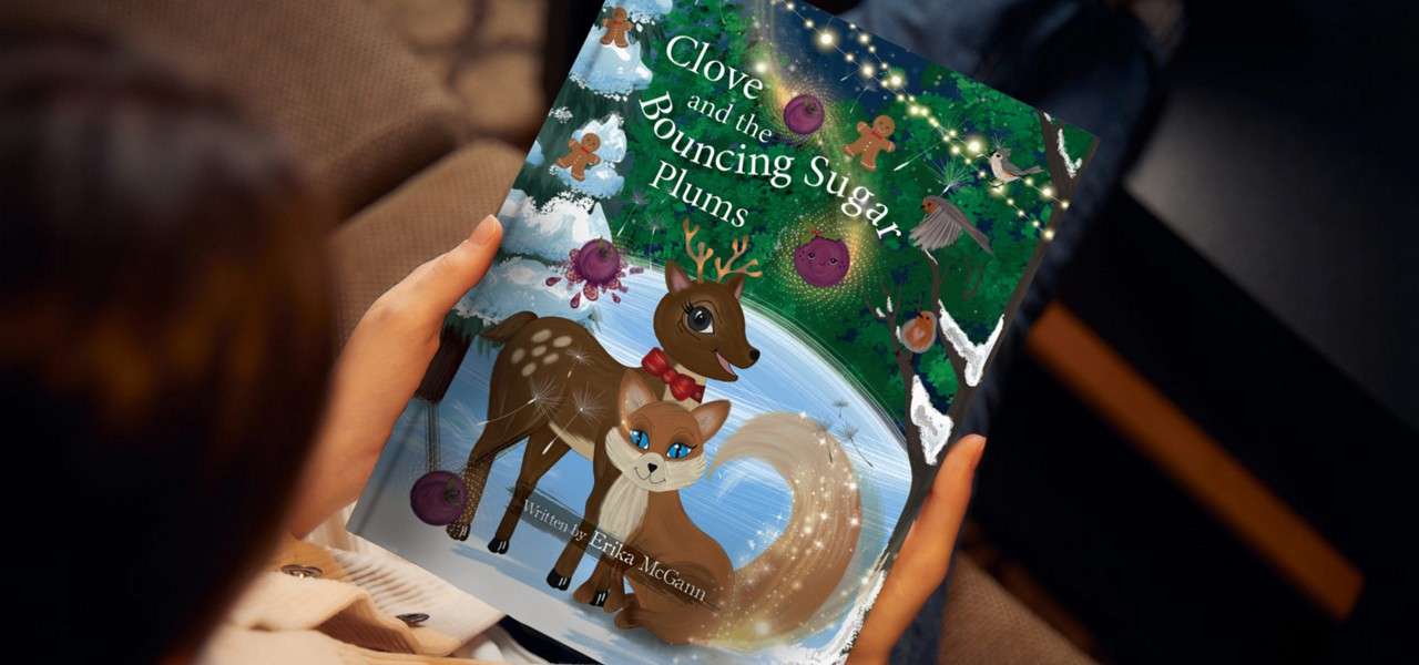 Young  girl holding a Christmas story.