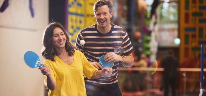 Couple playing Table Tennis