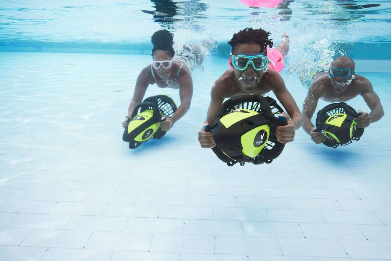 Young person swimming with an Aqua Jet.