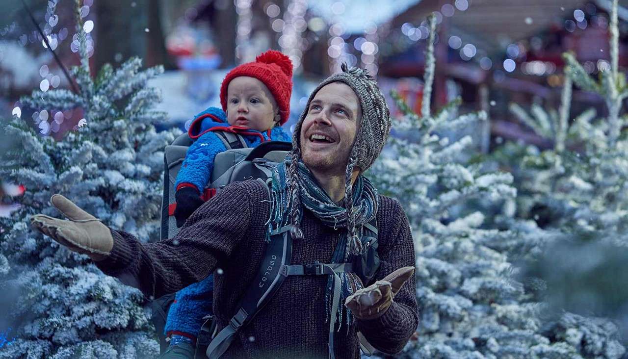 Father and son playing in the snow