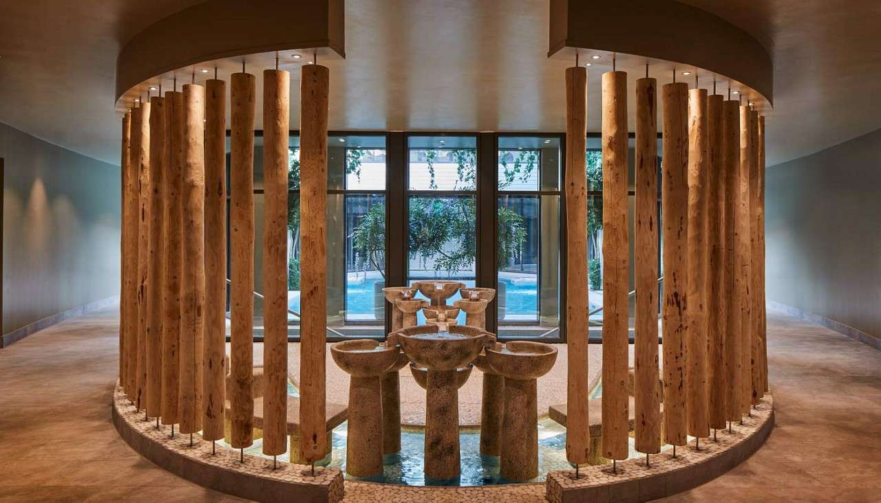 Curved wooden interior of the Sole Therapy room.