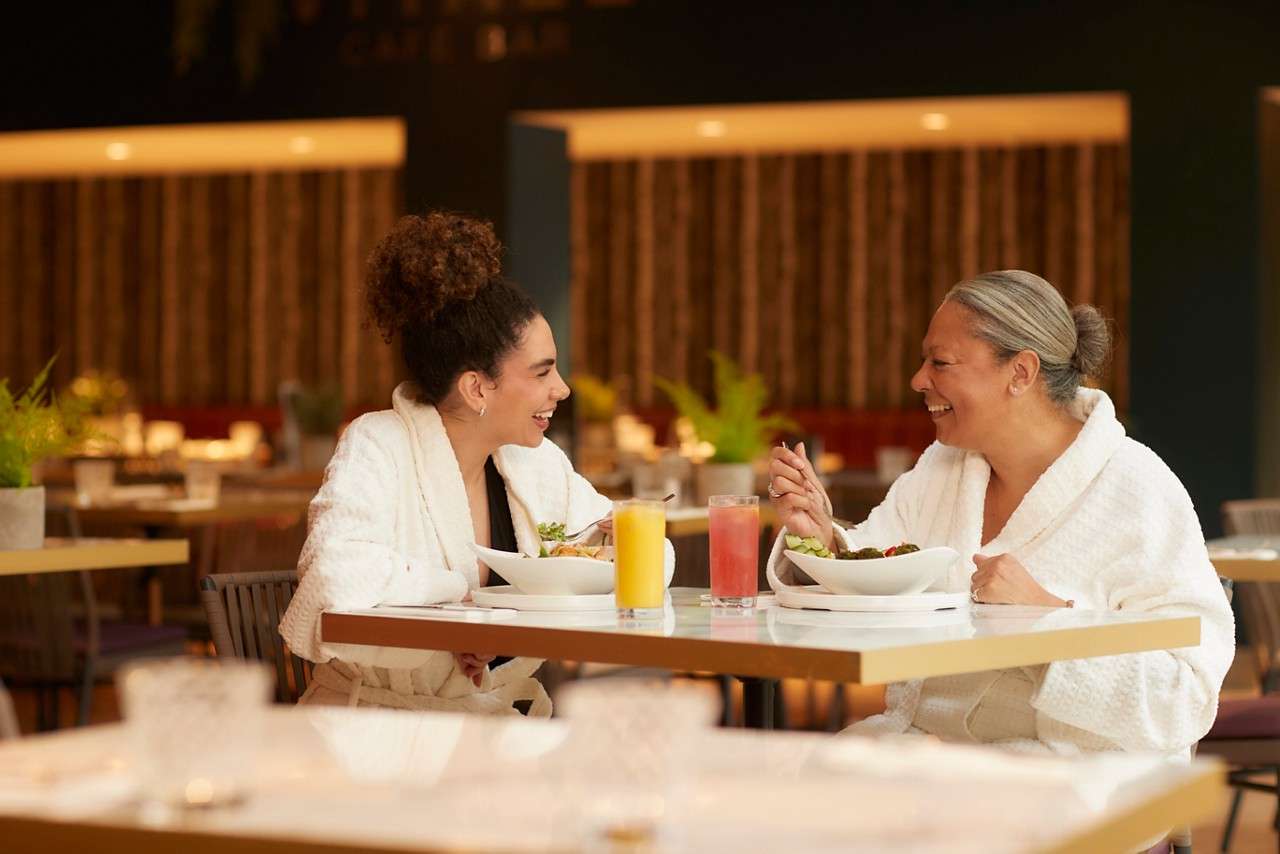 Two women having an Afternoon Tea.