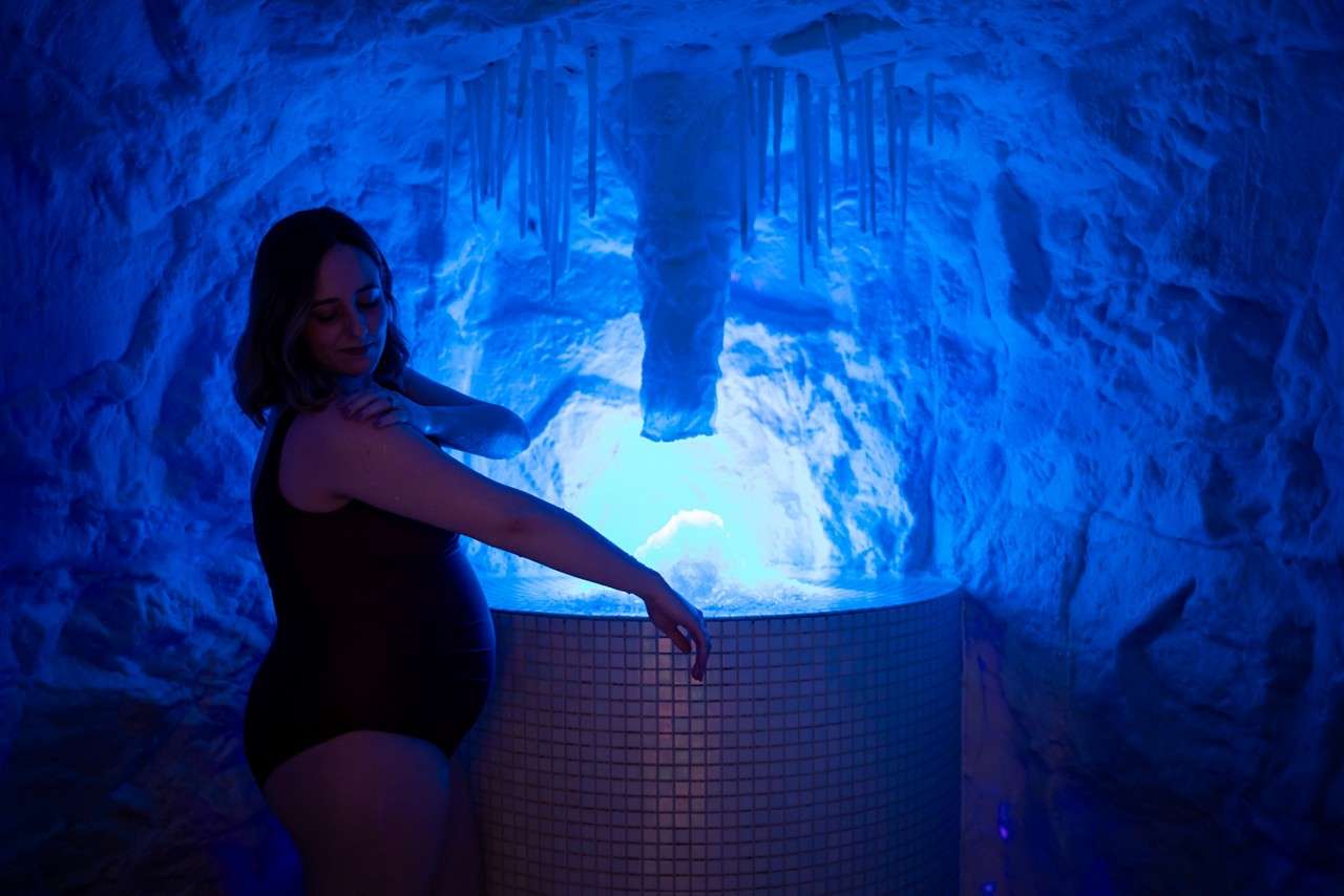 A glowing ice wall with a curved ledge.