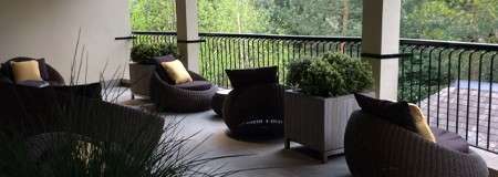 Comfortable egg chairs on an outdoor terrace.
