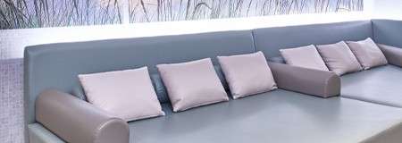 Smooth seating with throw cushions.
