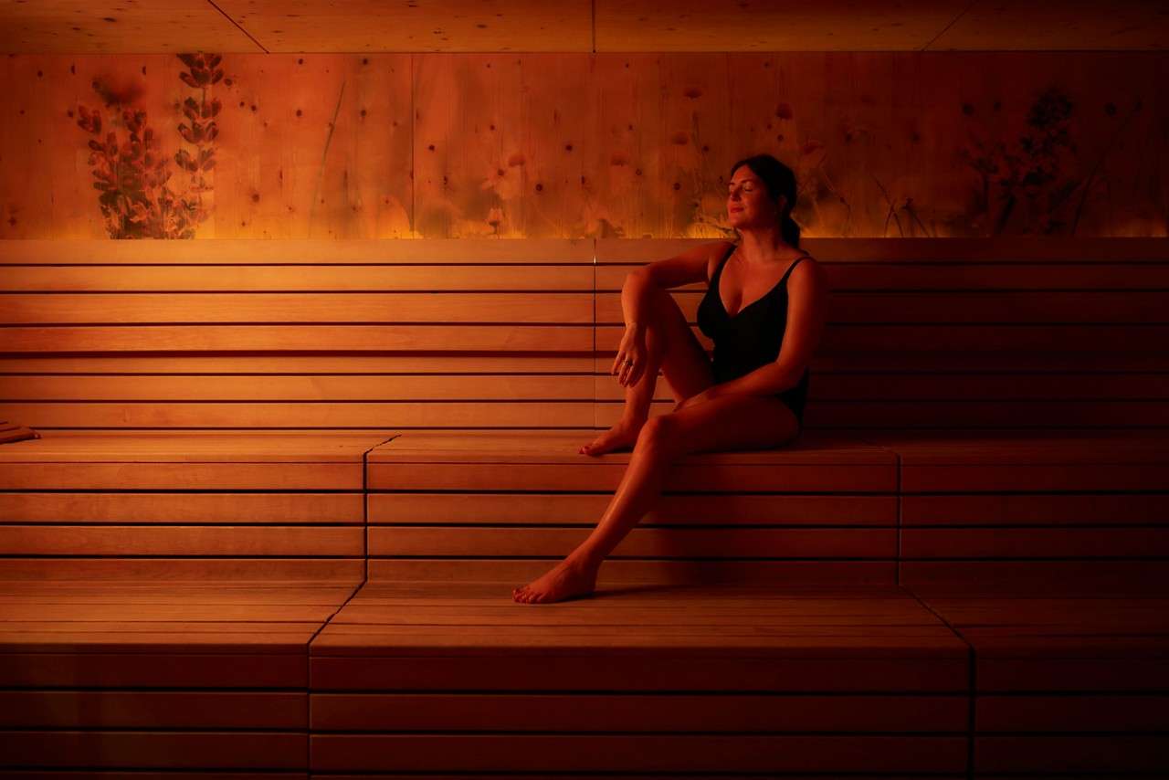 Woman laid inside a Herbal Sauna