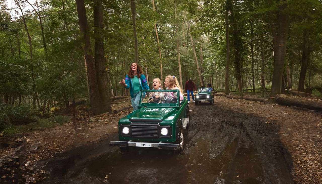 Two little girls on mini Rovers.