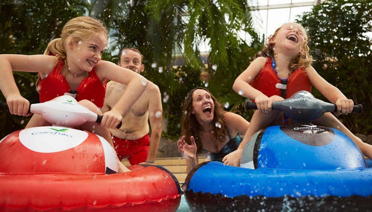 Two little girls on the mini jets in the Subtropical Swimming Paradise