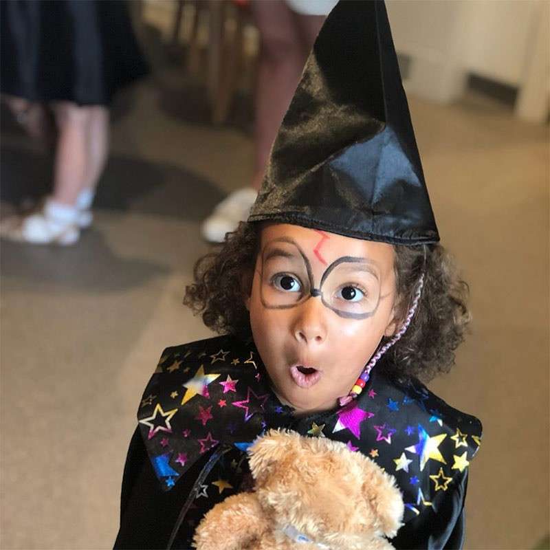 Child dressed up as a wizard