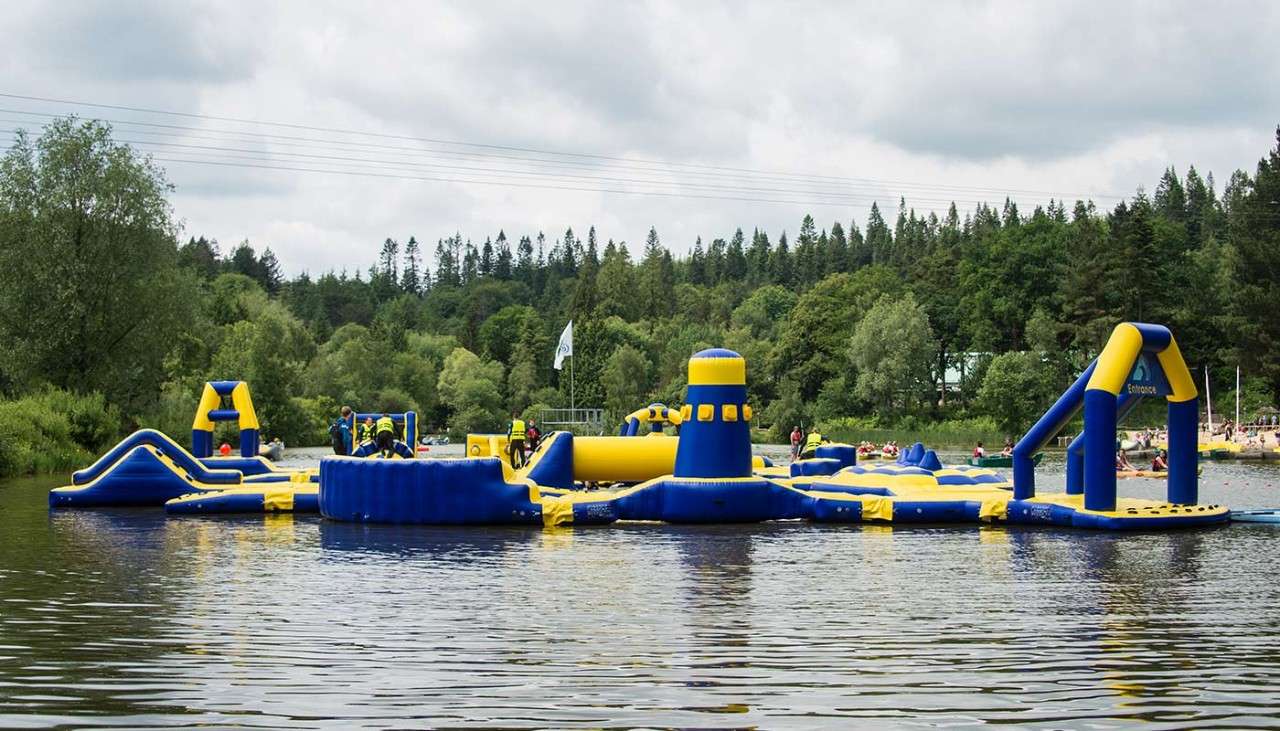 The inflatable Aqua Parc obstacle course set up on the lake 