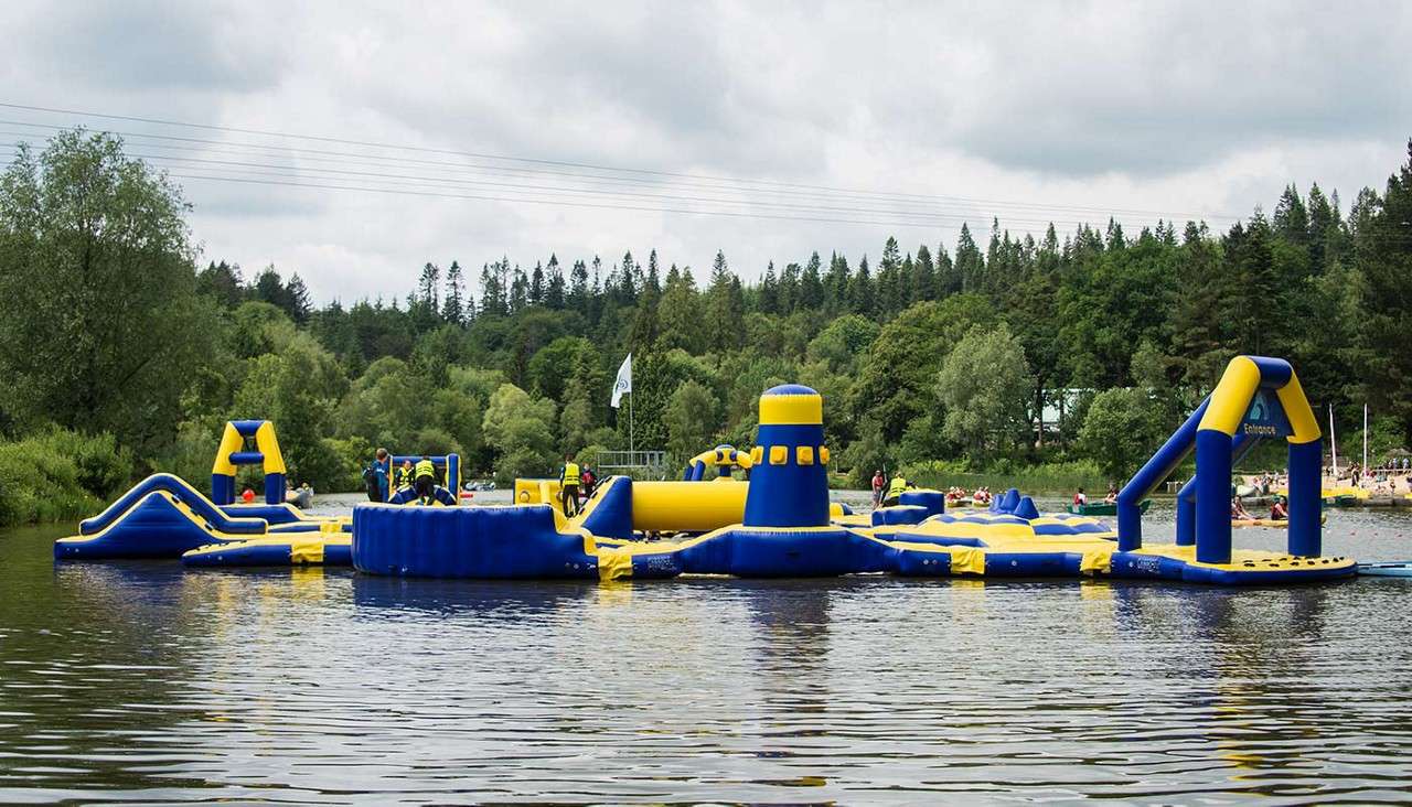 The inflatable Aqua Parc obstacle course set up on the lake 