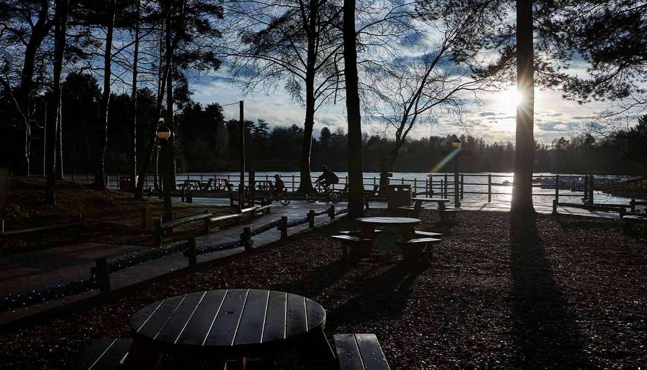 Cycling next to the lake.