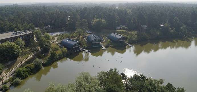 An ariel view of the Waterside lodges at Elveden Forest.
