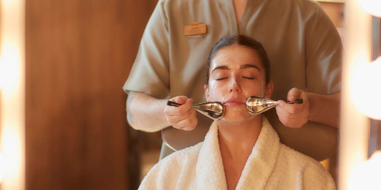 Woman having a relaxing facial massage.