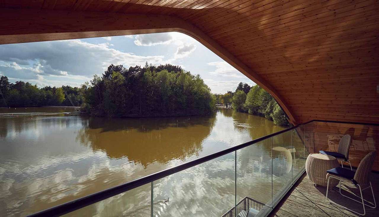 A view from the balcony of a Waterside Lodge over looking the calm peaceful lake.