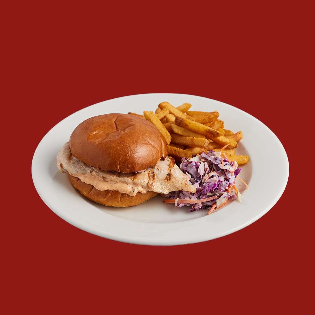 Grilled chicken burger in a brioche bun. Served with fries and slaw.