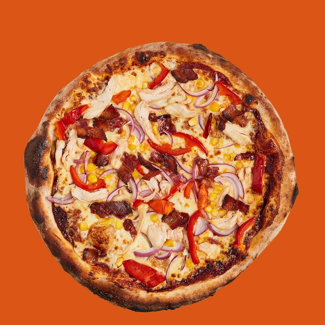 Sliced Italian pepperoni pizza with tomato sauce and mozzarella
