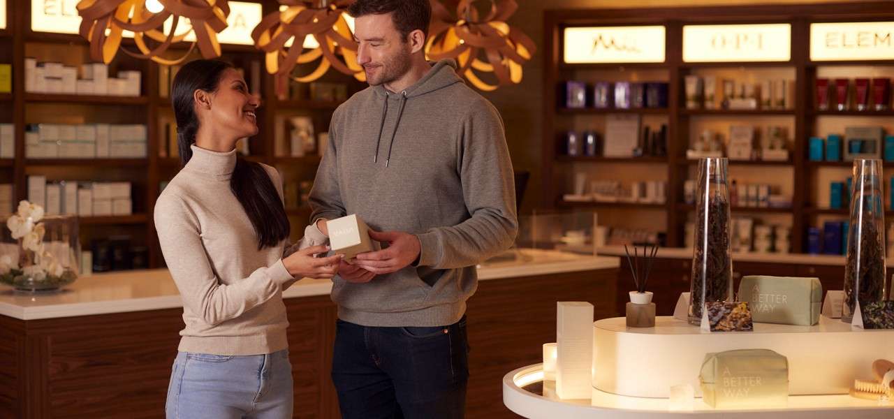 Couple looking at products in the Aqua Sana Boutique