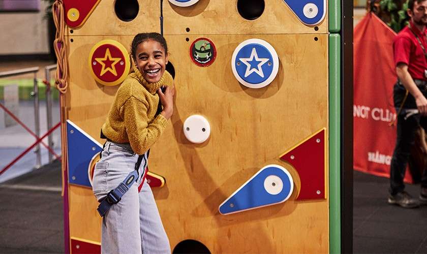 A girl on the indoor climbing activity.