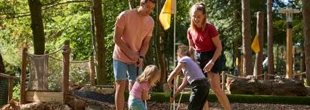A family playing adventure golf