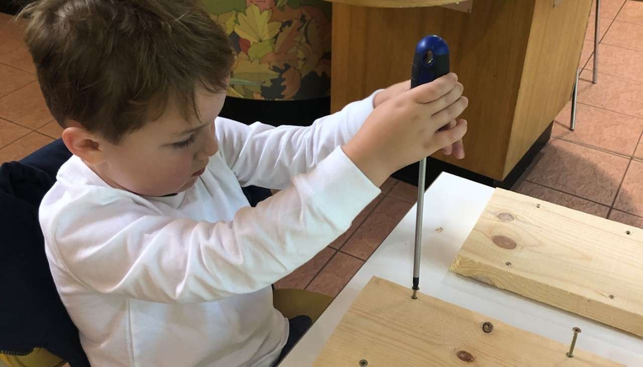 Boy building a nature box