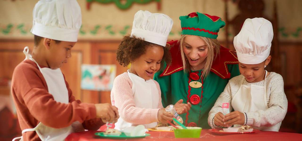 Young boys and girls decorating tasty treats