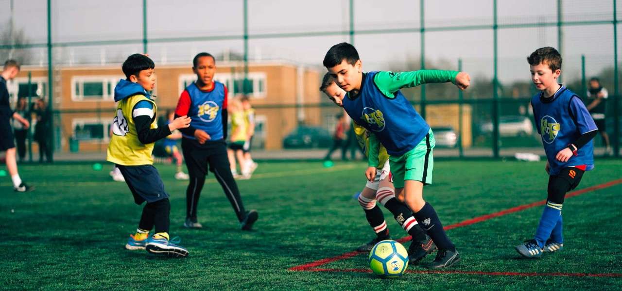 Kids playing football