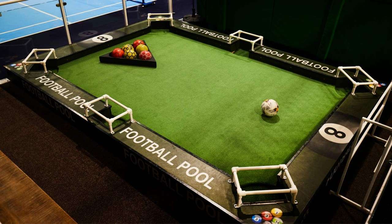 Family playing football pool