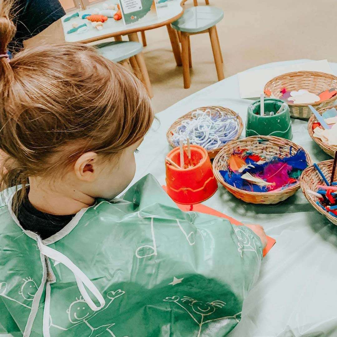Young girl doing some crafts