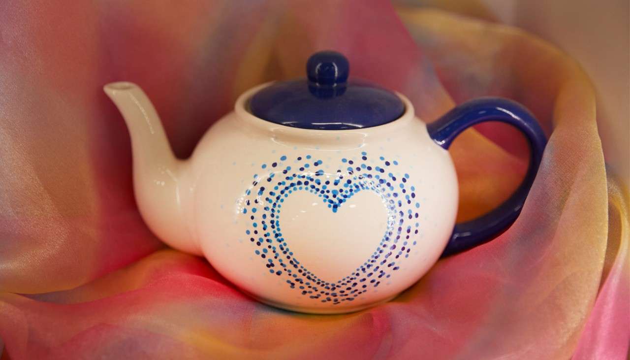Teapot with a love heart design on the side