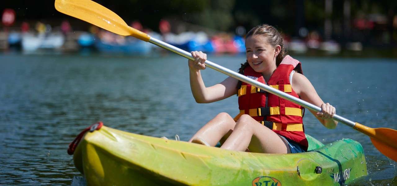 Young girl on a Single Kayak.