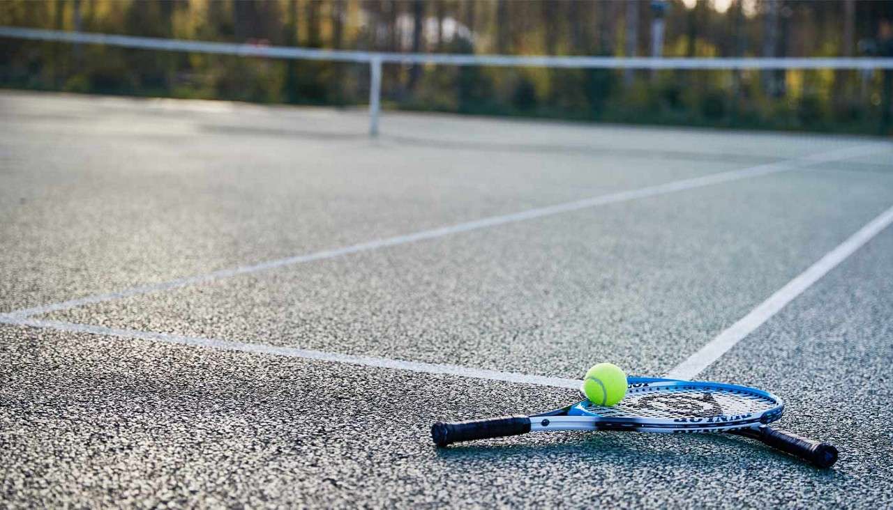 Tennis racket and ball