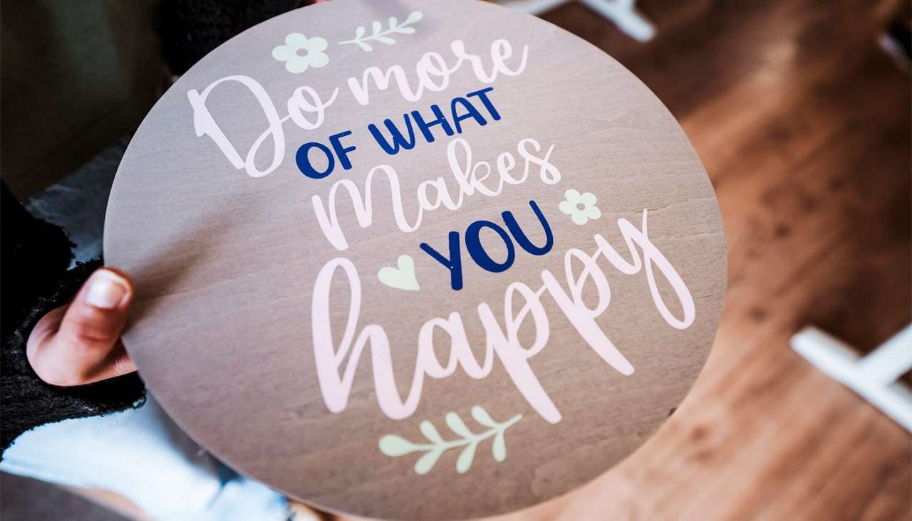 A decorated wooden plaque.