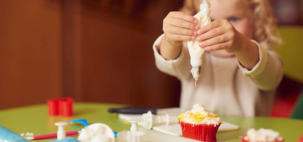 cupcake being decorated