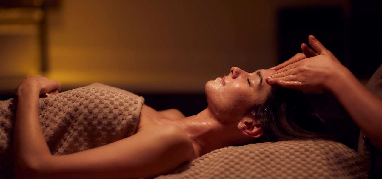 Woman receiving Elemis Pro Glow Resurface Facial