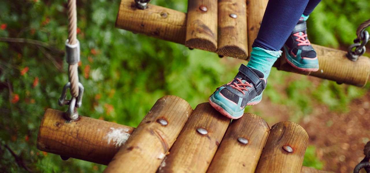 Child traverses Aerial Adventure