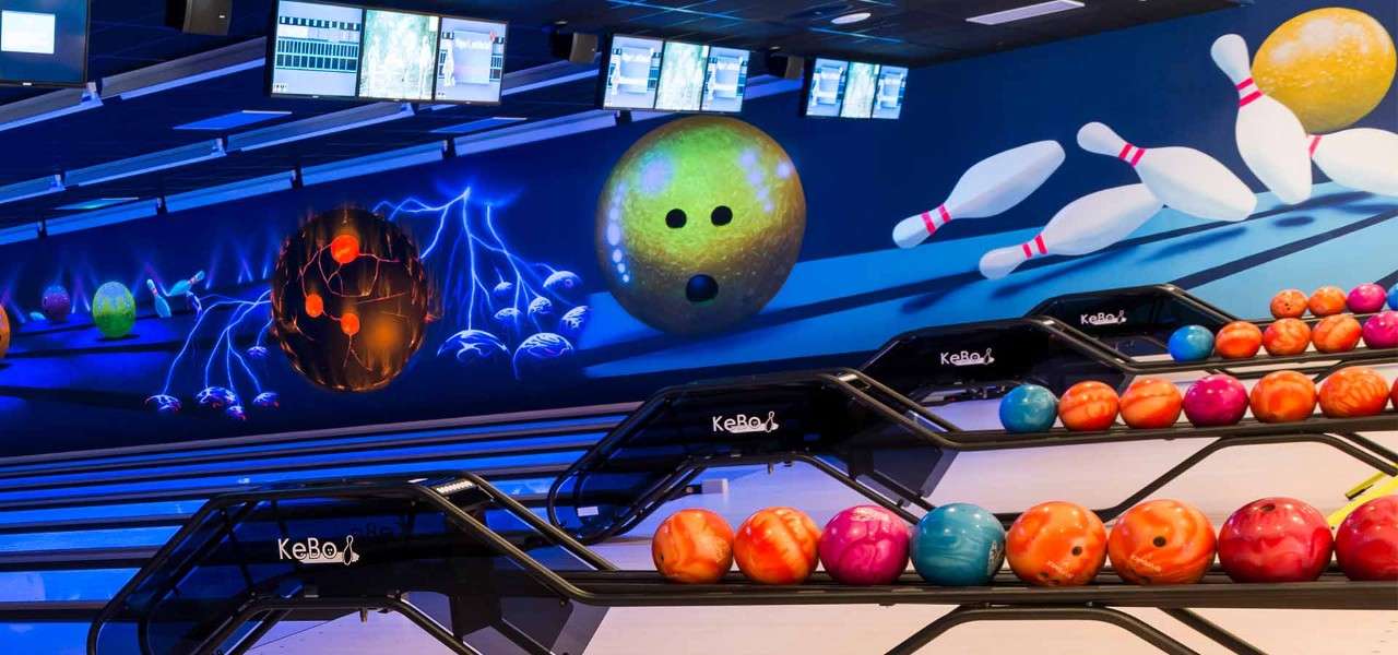 Bowling lanes with balls on stand