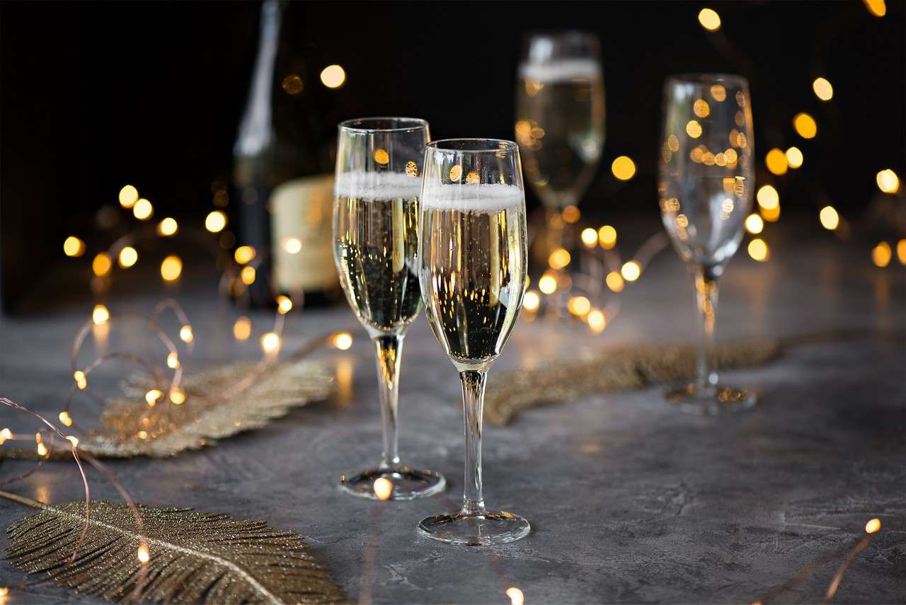 Champagne flutes and twinkling lights.
