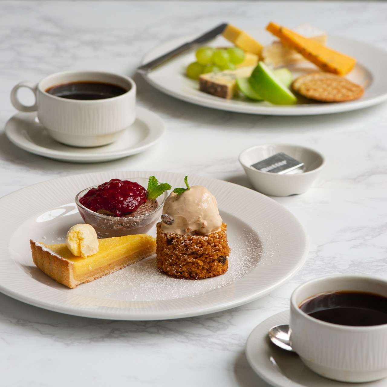 Selection of petit fours served on a plate.