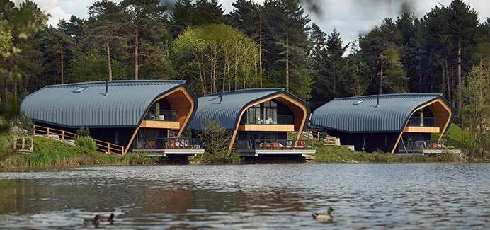 Waterside lodges next to the lake.